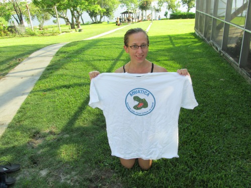 Amy Jackson gets her 200 K club shirt (which she plans on using as a tent).  Amy invites you to come out and join her on Wednesday's and Fridays at the YMCA Aquatic Center at 7:15 PM to play underwater hockey.